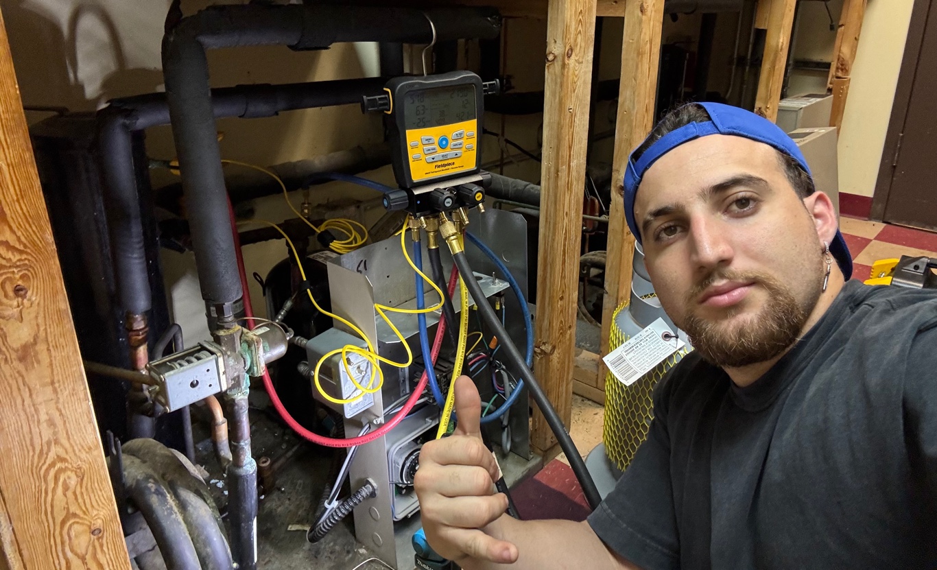 Gesser Services technician working on HVAC and maintenance